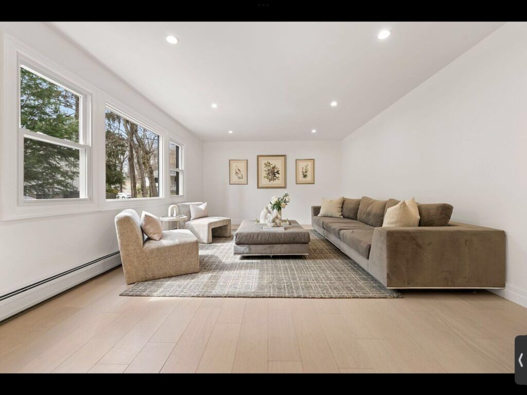 Bright living room with wood ceiling beams